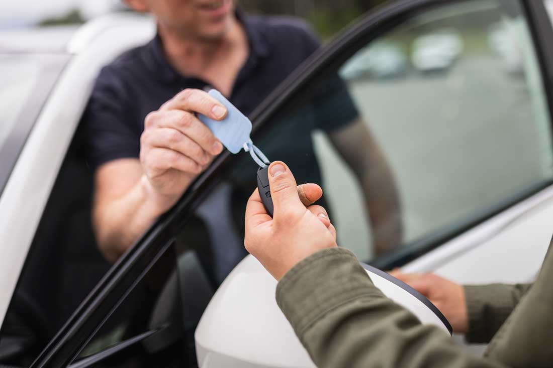 Someone gives another car keys
